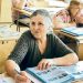 Пораснали ученици се потят над букварите